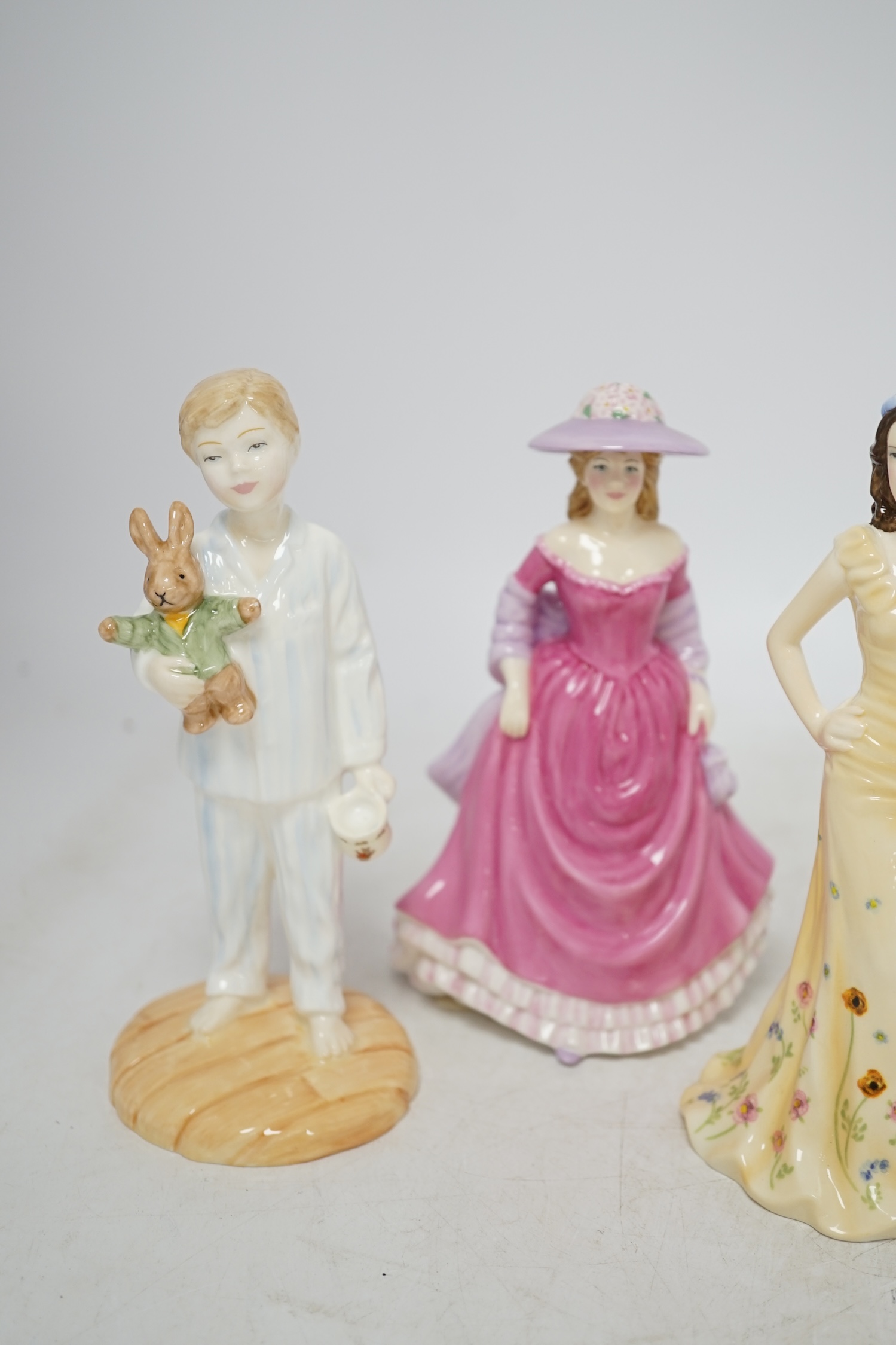 Seven Royal Doulton figures including Winters Day, Autumn Stroll, Spring Time and Summer Breeze, some with Certificates of authenticity, all boxed. Condition - good